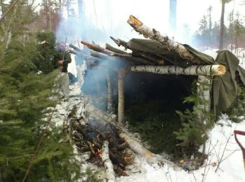 This is an improvised shelter that was constructed by one tent group. It could host all nine personnel from that group comfortably for the night.