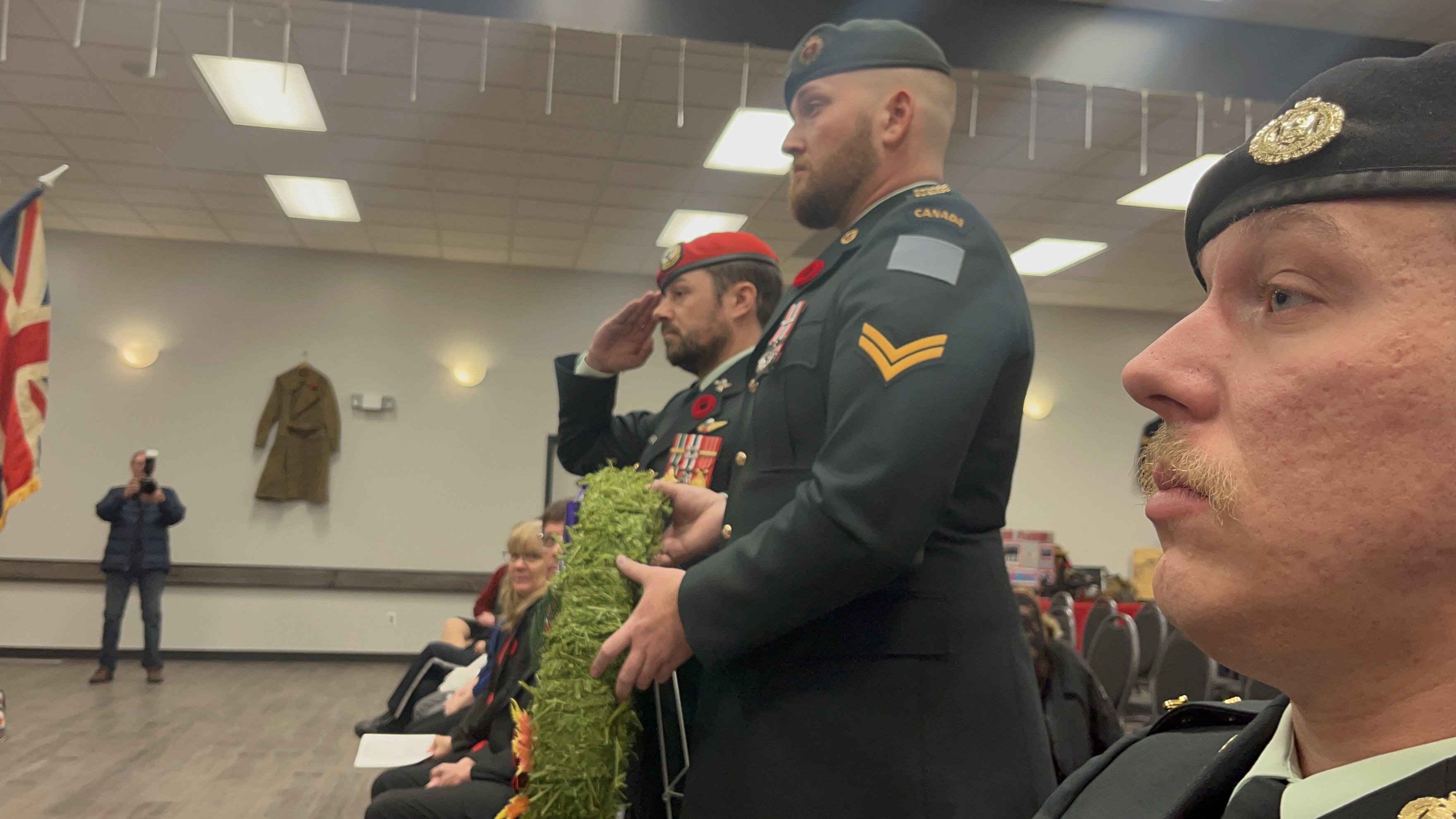 Captain Stephen Moss (left) and Corporal Adam Dutrisac (right) proceed to lay the wreath during Fox Creek, Alta.’s Remembrance Day ceremony. Photo by Capt Kyle Ho, Real Property Operations Unit (West)