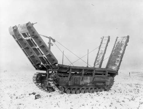 The Churchill Arc Bridge was driven into the gap, using the tank chassis as a pier.
