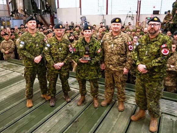 Cpl McCurdy of 36 CER receiving the Sgt George Miok Trophy