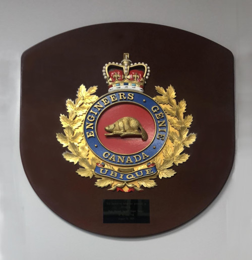 Carving of the engineer cap badge by Edgar that he donated to CFSME and currently hangs in the School CWO’s office.
