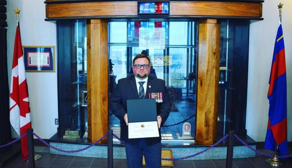 Cpl Kyle Scott receiving CME Commendation at 1 CER Edmonton 25 Mar 21