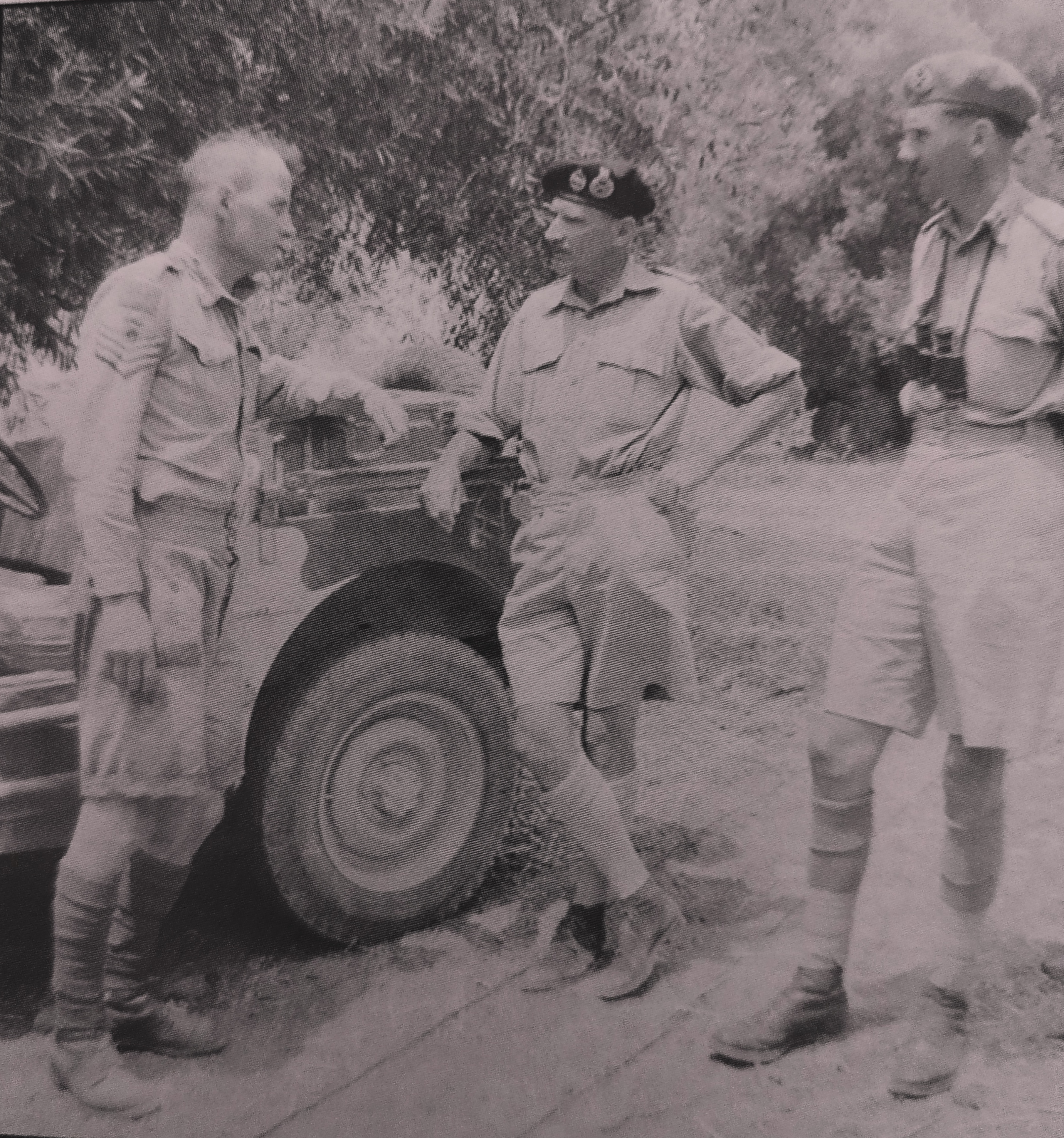 Sgt Russell McPhee, Gen Bernard Montgomery and MGen Guy Simmons speak in August 1943