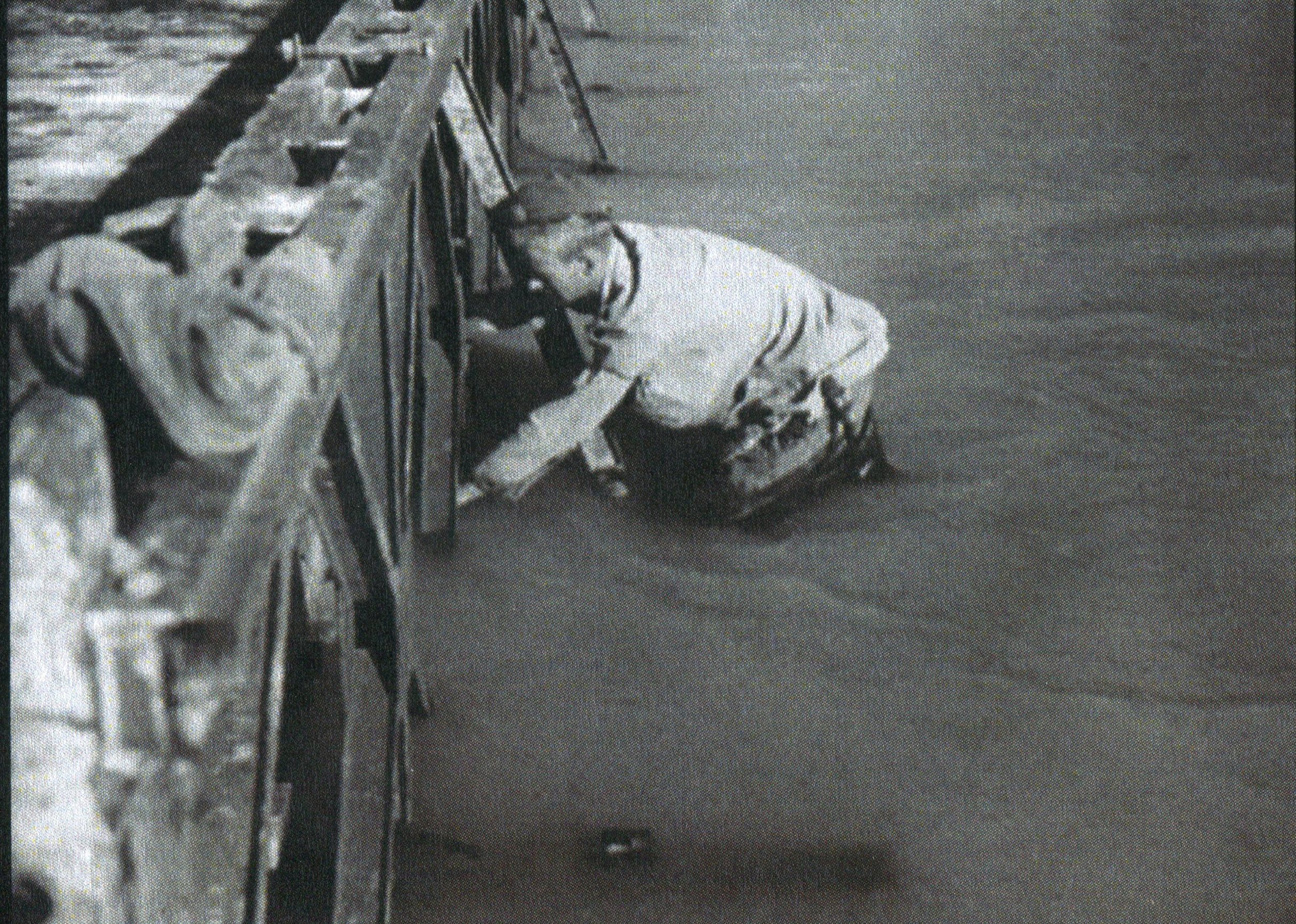 Spr LW Robinson working on a Bailey Bridge over the Metauro River Bailey 26 Aug 44
