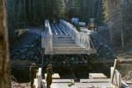 Combat engineers work on the bridge across the Tetagouche River that will be used by recreational vehicles year round. (5th Canadian Division/Contributed)/Des sapeurs de combat construisent le pont de la rivière Tetagouche, lequel sera ouvert à l’année aux véhicules récréatifs. (Photo : contribution de la 5e Division du Canada)