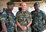 Senior Liaison Officer LCol JT Galuga was MONUSCO’s representative to the Forces Armées de la République Démocratique du Congo (FARDC), the national Congolese army, from June to December, 2014. He is pictured with two FARDC officers in the town of Mavivi in North Kivu, DRC in July, 2014. Photo courtesy of LCol JT Galuga / Le Lcol JT Galuga, officier supérieur de liaison, était le représentant de la MONUSCO auprès des Forces armées de la République Démocratique du Congo (FARDC), l’armée congolaise nationale 