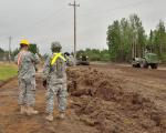 United States Army reservists from 980th Engineer Battalion in Austin, Texas, carry out roadwork at 5 Wing Goose Bay, Newfoundland and Labrador, one of five large construction projects. PHOTO: DND // Des réservistes de l’Armée américaine du 980th Engineer Battalion d’Austin, au Texas, exécutent des travaux routiers à la 5e Escadre Goose Bay (Terre Neuve et Labrador) dans le cadre de l’un des cinq grands projets de construction qu’ils sont venus réaliser. 