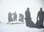 Soldiers from 41CER move snow as part of the building snow defences portion of Exercise SURVIVING SAPPER in Cooking Lake. Alberta, from January 22-24. 2016.
