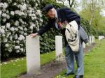 Canadian Second World War veteran Don Sommerville, 92, of Mississauga, Ont., visits the grave of friend Cpl. W.A. Martel following a commemorative ceremony at Holten Canadian War Cemetery in Holten, Netherlands, on Monday, May 4, 2015, on the eve of the 70th anniversary of the Liberation of the Netherlands. Photo by Sean Kilpatrick/ Canadian Press
