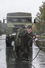 Cpl Deny Cassista (Team 2) pulling a Spanish military vehicle