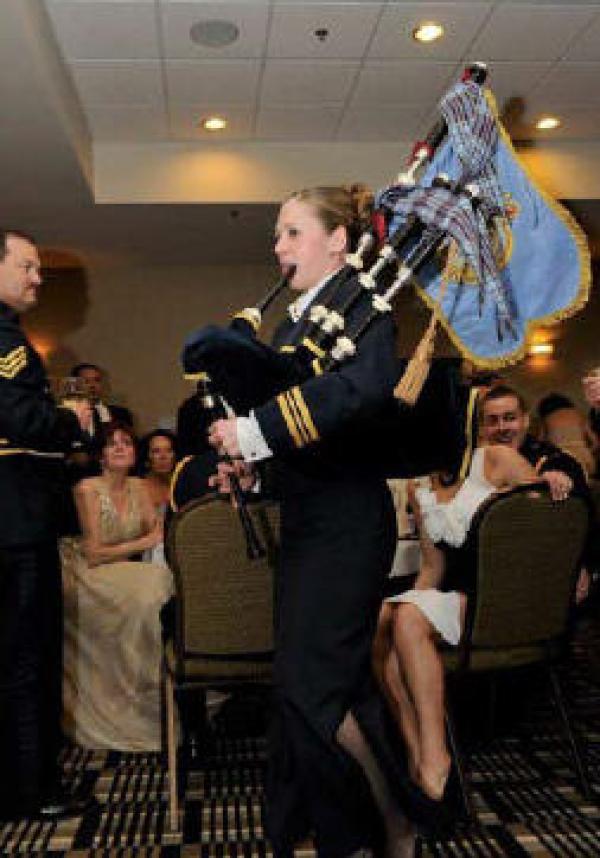 Maj Sarah House, CO 14 CES as she "volunteered" to pipe in the Port