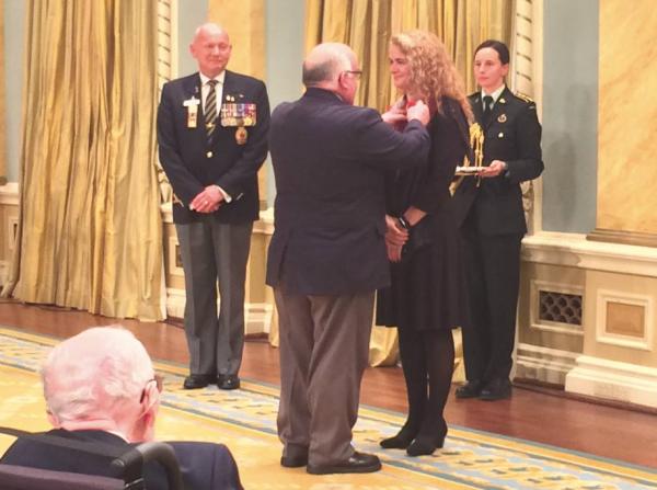 The Royal Canadian Legion’s president David Flannigan presented the symbolic First Poppy to Her Excellency the Right Honourable Julie Payette, Governor General and Commander-in-Chief of Canada receives the symbolic First Poppy from the President of the Royal Canadian Legion.