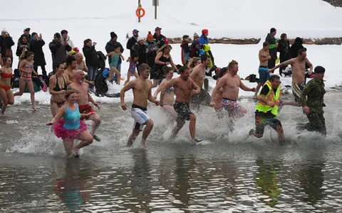Seventy-seven brave souls kicked off 2017 with a splash as the 31st annual Polar Bear Swim brought a large crowd of spectators and some eager swimmers to Gyro Park in Trail.— Image Credit: Guy Bertrand Photo