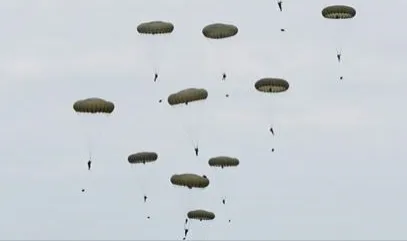 23 Parachute Engineer Regiment parachute on the Stanford Training Area in 2011 with their American and German counterparts.