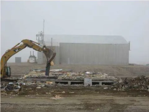 Building demolition in Cape Dyer. 