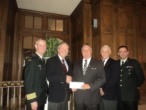 Mr. Ted House of TD Meloche Monnex Presenting $ 6,000 Cheque to CMEA