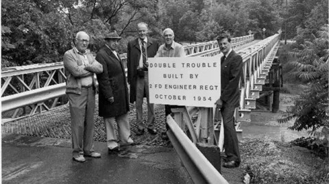 After Hurricane Hazel, officers from the 2nd Field Engineer Regiment created a Baily Bridge. In 1984, members of the regiment including, from left to right, are Lt/Col Ron Milne, Lt/Col Art Keith, Captain Tom Hatch, Major Mid Kitchen, and Lt/Col John Wasteneys, were granted was granted the Freedom of Metropolitan Toronto in recognition of its work in restoring bridges in southern Ontario in 1954. Oct. 7, 2016. (Mid Kitchen photo)