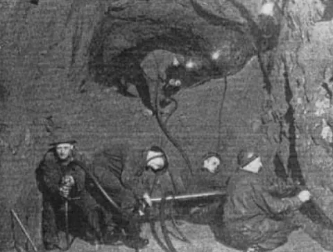 A shift of 1 Tunnelling Company drills the tunnel walls in preparation for blasting