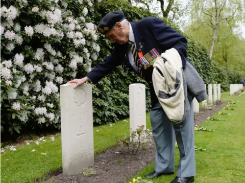 Canadian Second World War veteran Don Sommerville, 92, of Mississauga, Ont., visits the grave of friend Cpl. W.A. Martel following a commemorative ceremony at Holten Canadian War Cemetery in Holten, Netherlands, on Monday, May 4, 2015, on the eve of the 70th anniversary of the Liberation of the Netherlands. Photo by Sean Kilpatrick/ Canadian Press