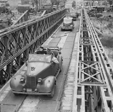 Churchill and Montgomery cross RCE-built bridge in Caen 22 July 1944