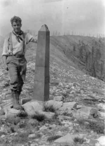 Gerry Andrews at Mount Hefty along the US-­‐Canada boundary during the summer of 1930 when he was crew chief for a forest inventory in the North Fork of the Flathead valley.