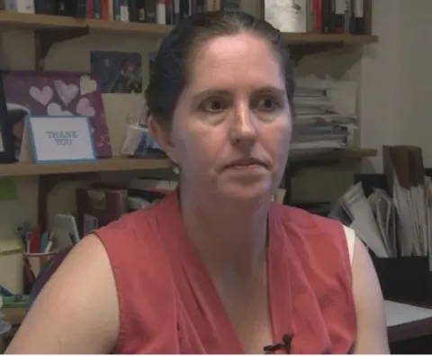 Kirrily Freeman, an associate professor in the department of history at Saint Mary's University in Halifax, researches the life of one member of the No. 2 Construction Battalion who is buried in Supt. (CBC)