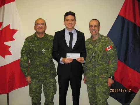 MCpl Mateus-Rodriguez, Bursary Winner Daniel, and CWO Chiasson