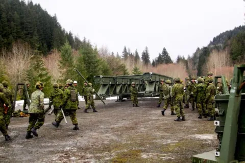 The exercise involved building three types of bridges including an Acrow Bridge, a prefabricated, modular steel bridge. Hosted by the 39 CER at the 3rd Canadian Division Support Group Detachment in Chilliwack, BC. The exercise took place at the end of December. Photo: Sgt Greg Gorecki/41 CER