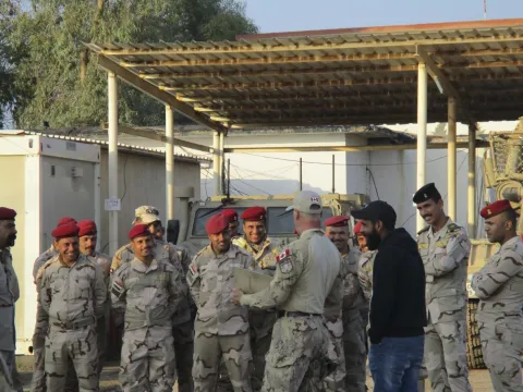 Sergeant Don Read with the Route Clearance Package Training Team provides members of the Iraqi security forces with feedback after a day of training in northern Iraq, November 2018. Photo: Op IMPACT Imaging