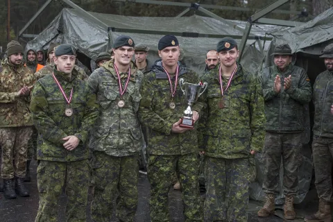 Team 1, Sapper Mark MacDougall (left middle) and Sapper Mathieu Lavoie (right)